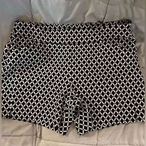 Pull-on size 6 INC shorts . Black and white diamond pattern. Stretchy fabric.